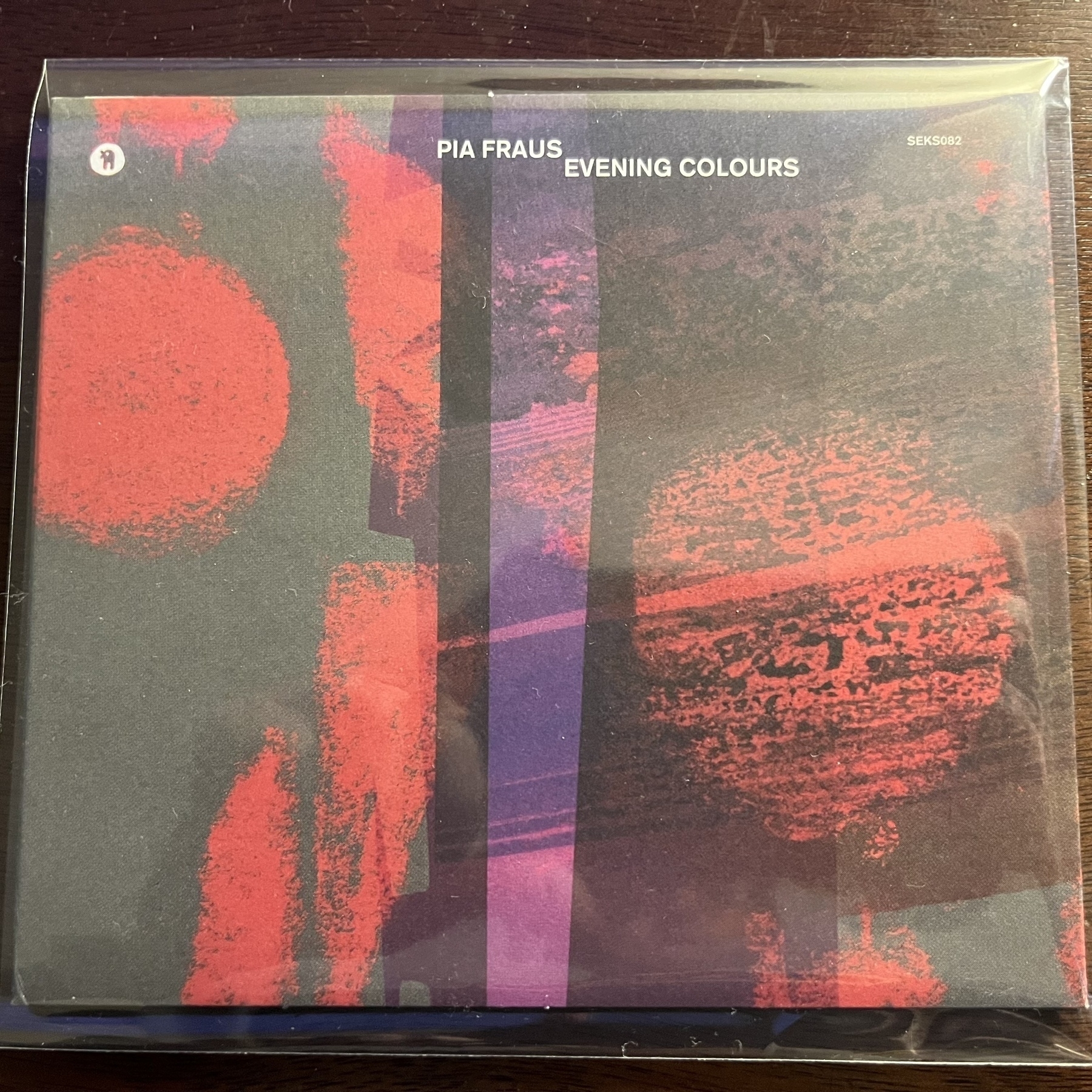 A CD cover features abstract red and purple designs with the text "PIA FRAUS EVENING COLOURS."